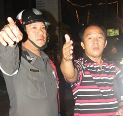 Wichai Tuengjeamsri tries to explain to police what happened.
